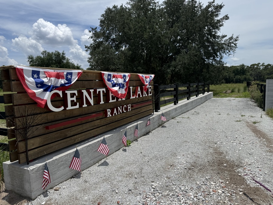 Black fence beside the Center Lake Ranch entrance