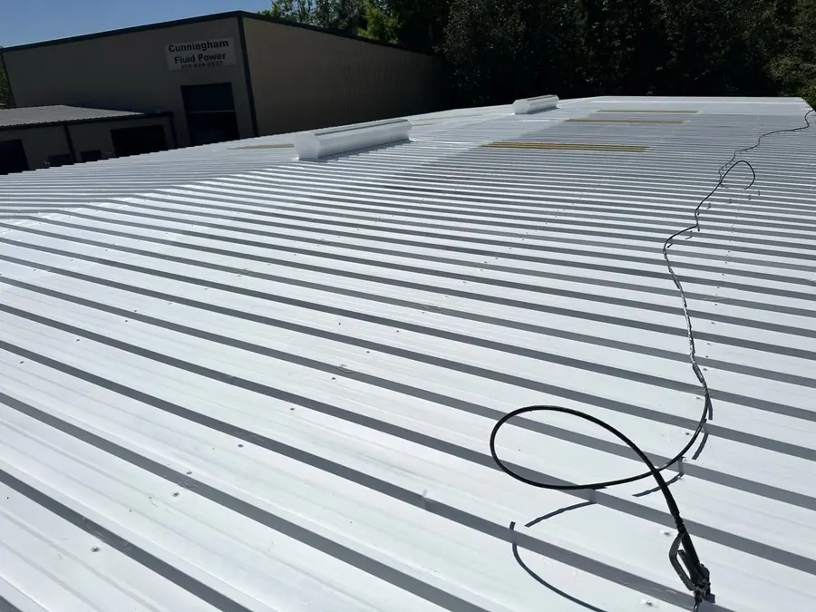Finished white coating on a commercial metal roof
