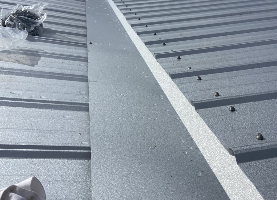 Metal roof finish from a Layfield Roofing and Construction project