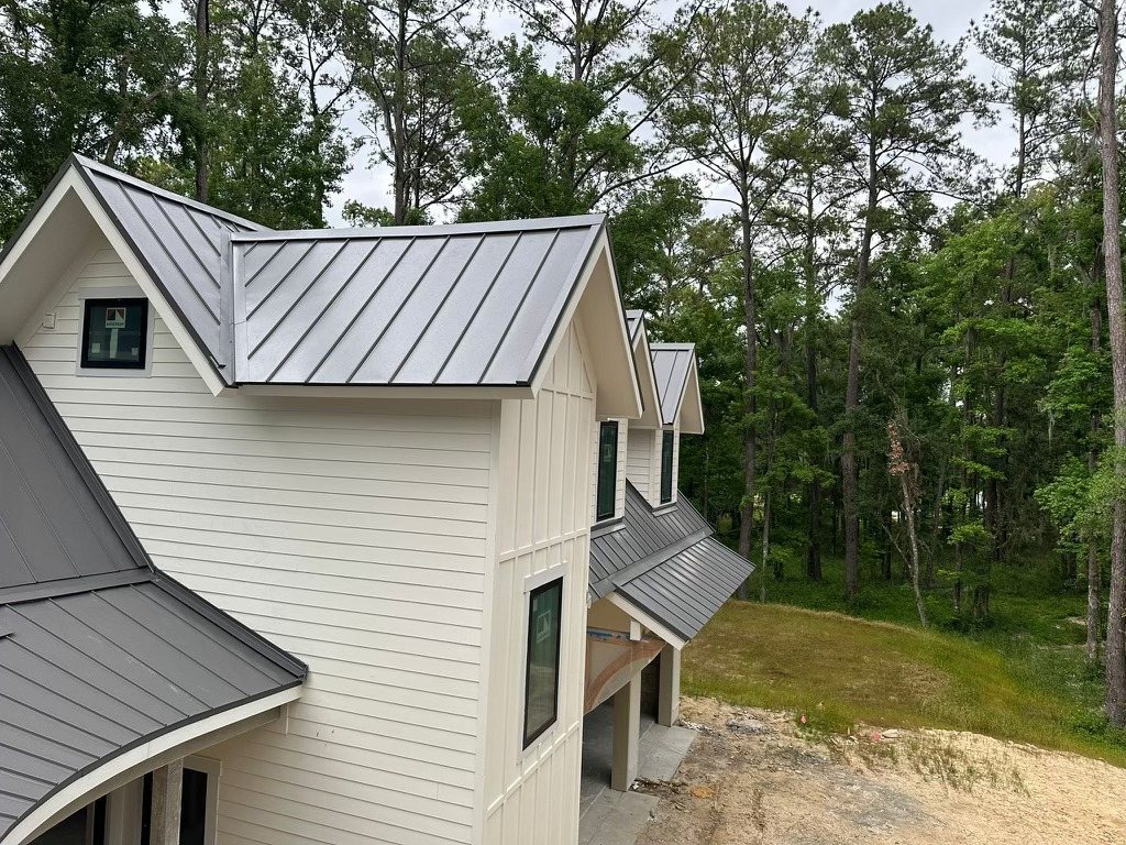 Finished standing seam metal roof on a residential property