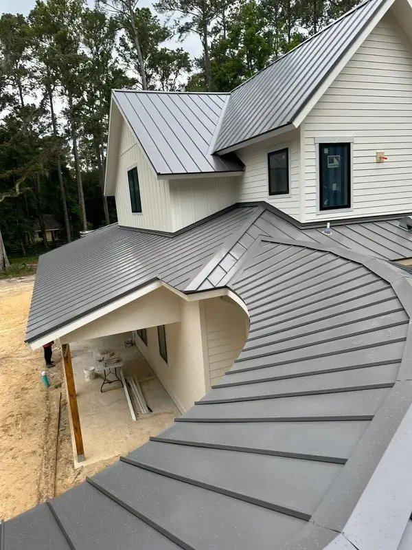 Finished standing seam metal roof on a residential property