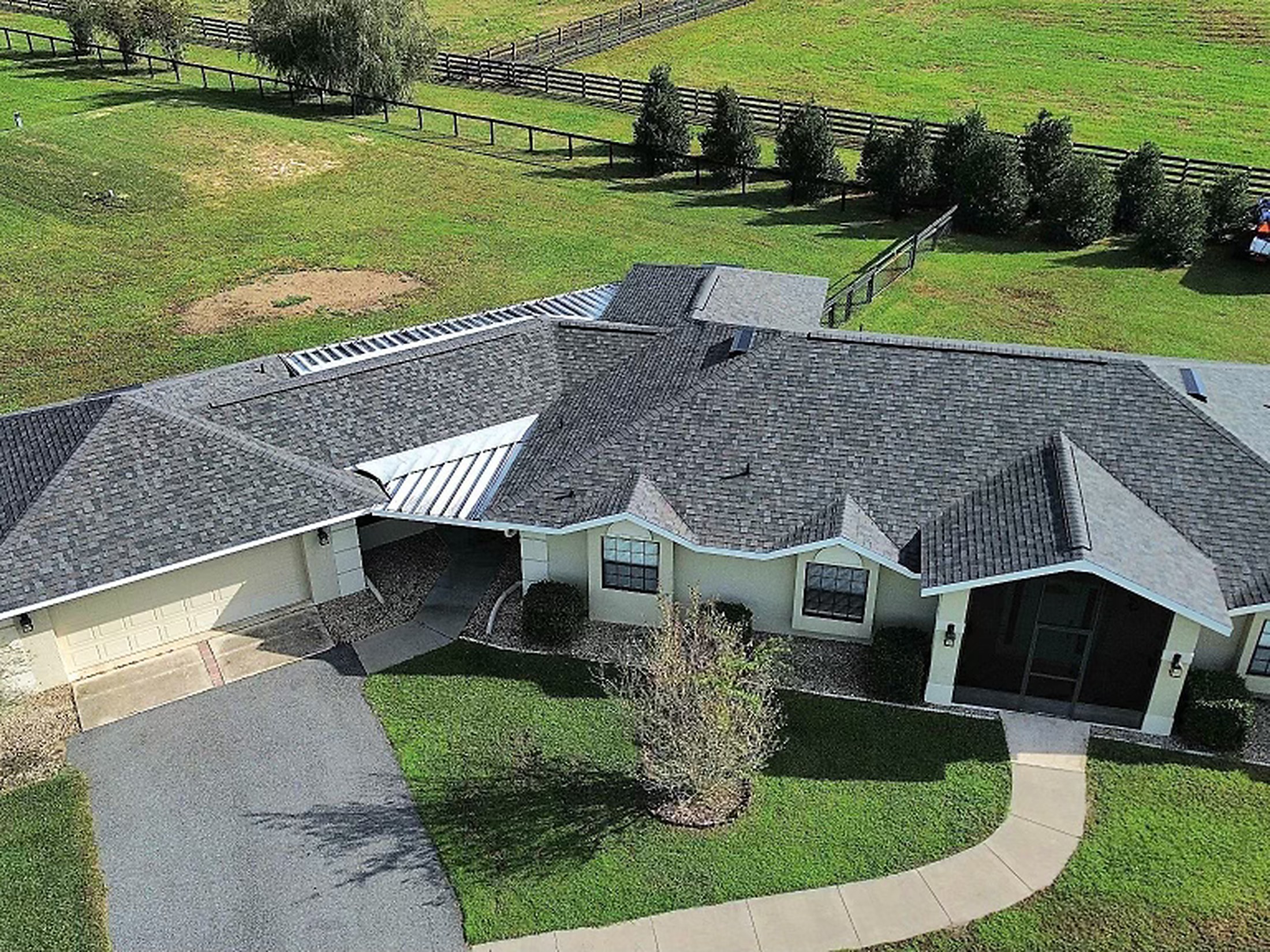 Finished shingle roof on a residential home viewed from above