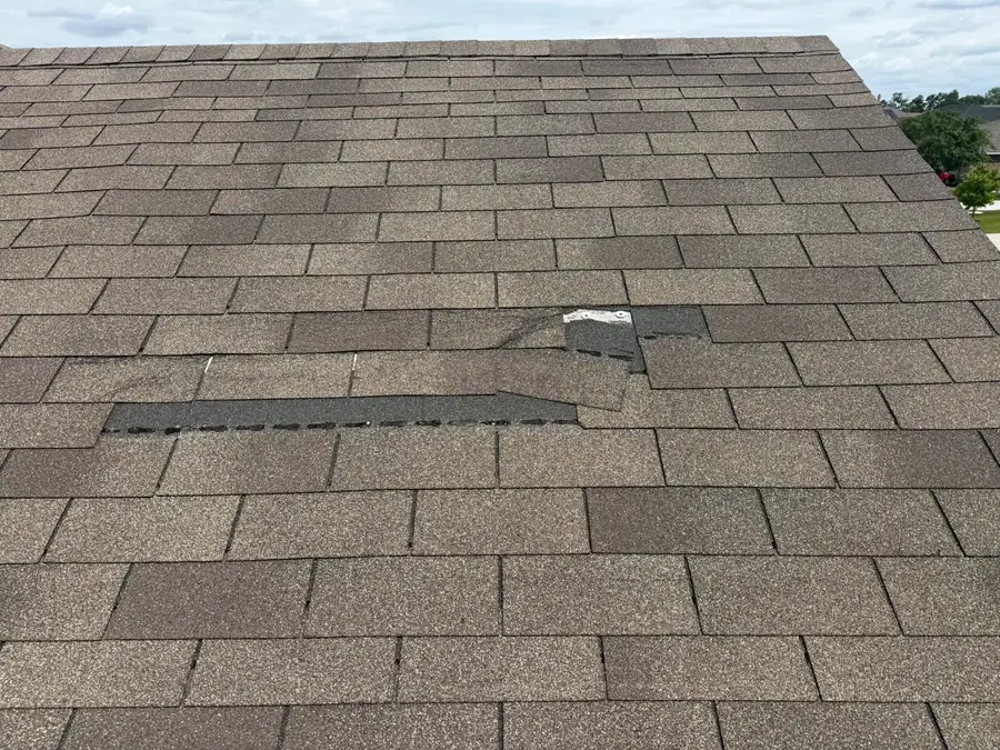 Small patch repair on a shingle roof