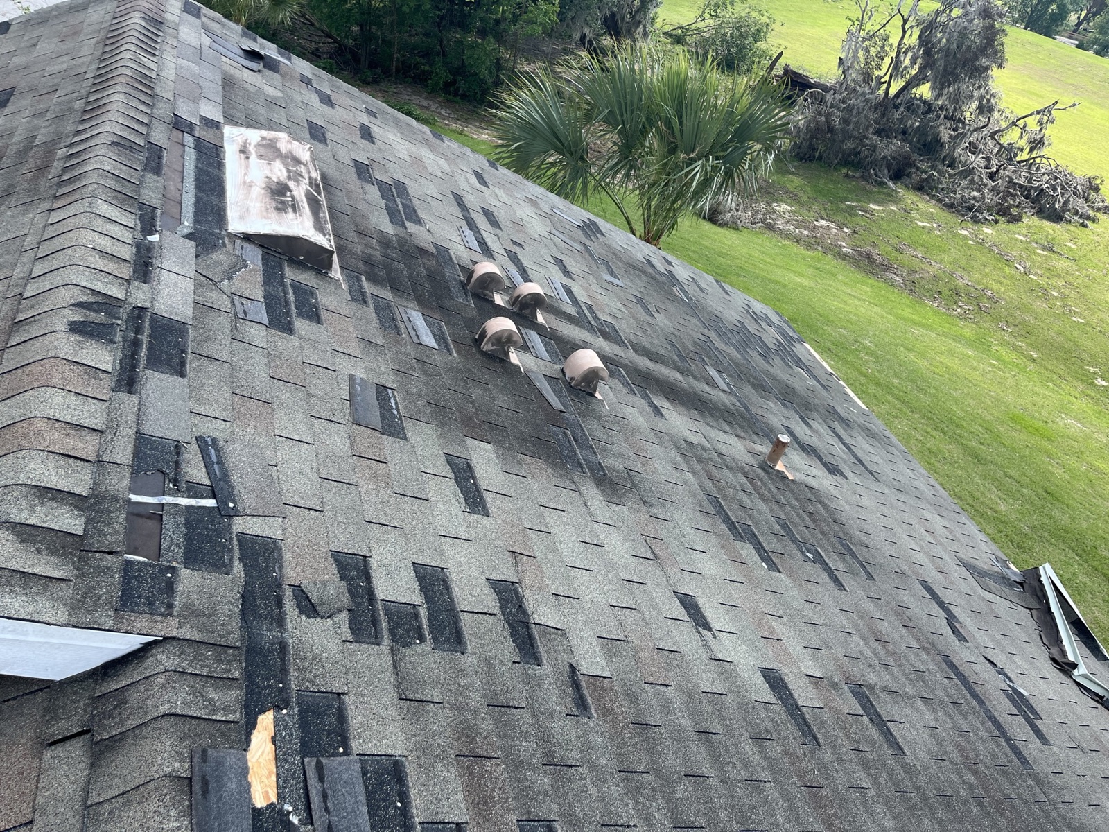 Emergency roof repair patches after storm damage